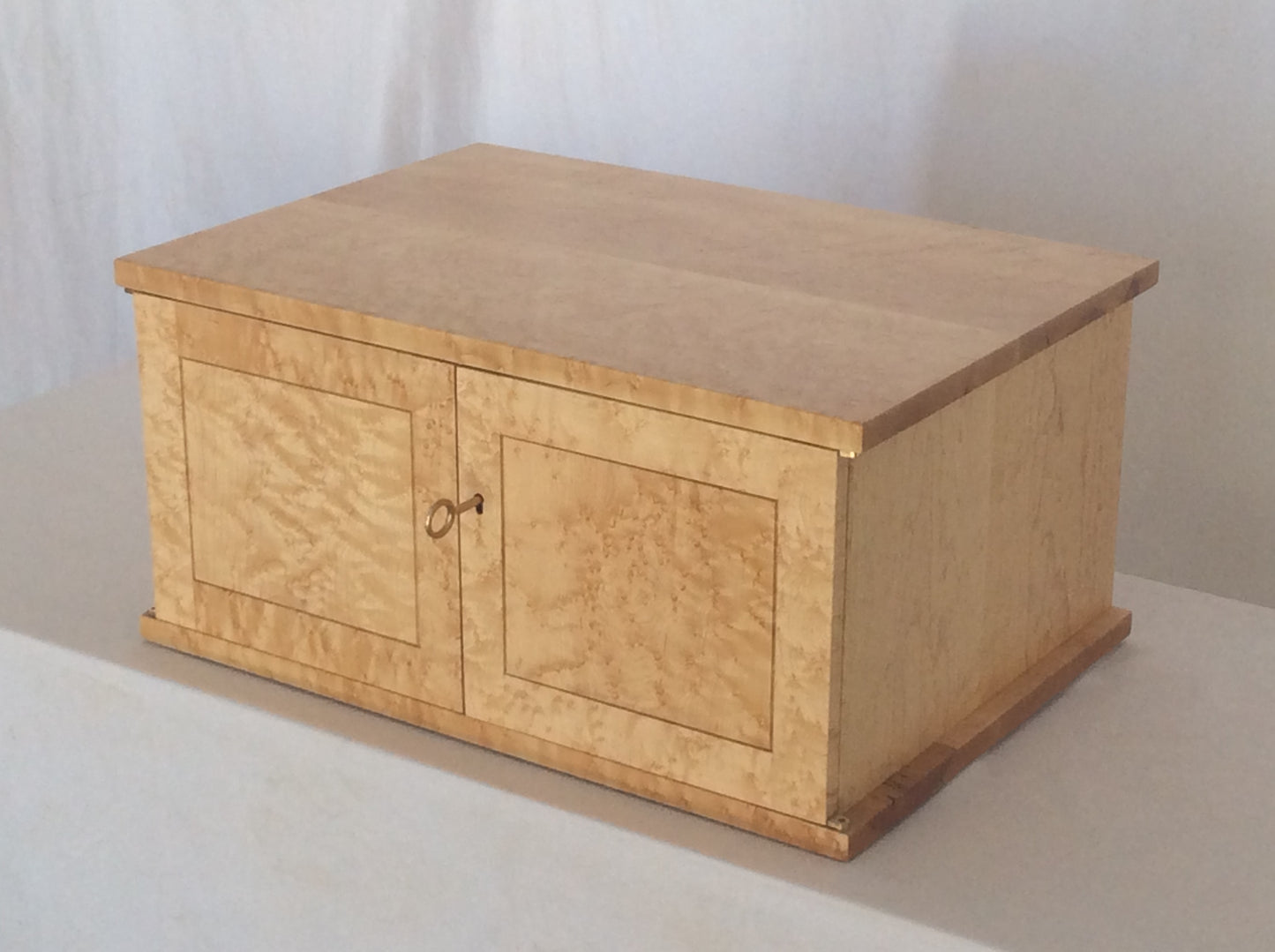 The Ten Drawer Cabinet can organize over a hundred pieces of jewelry. Behind the key lock doors are ten drawers that can be customized with unique organization of dividers to fit your collection.