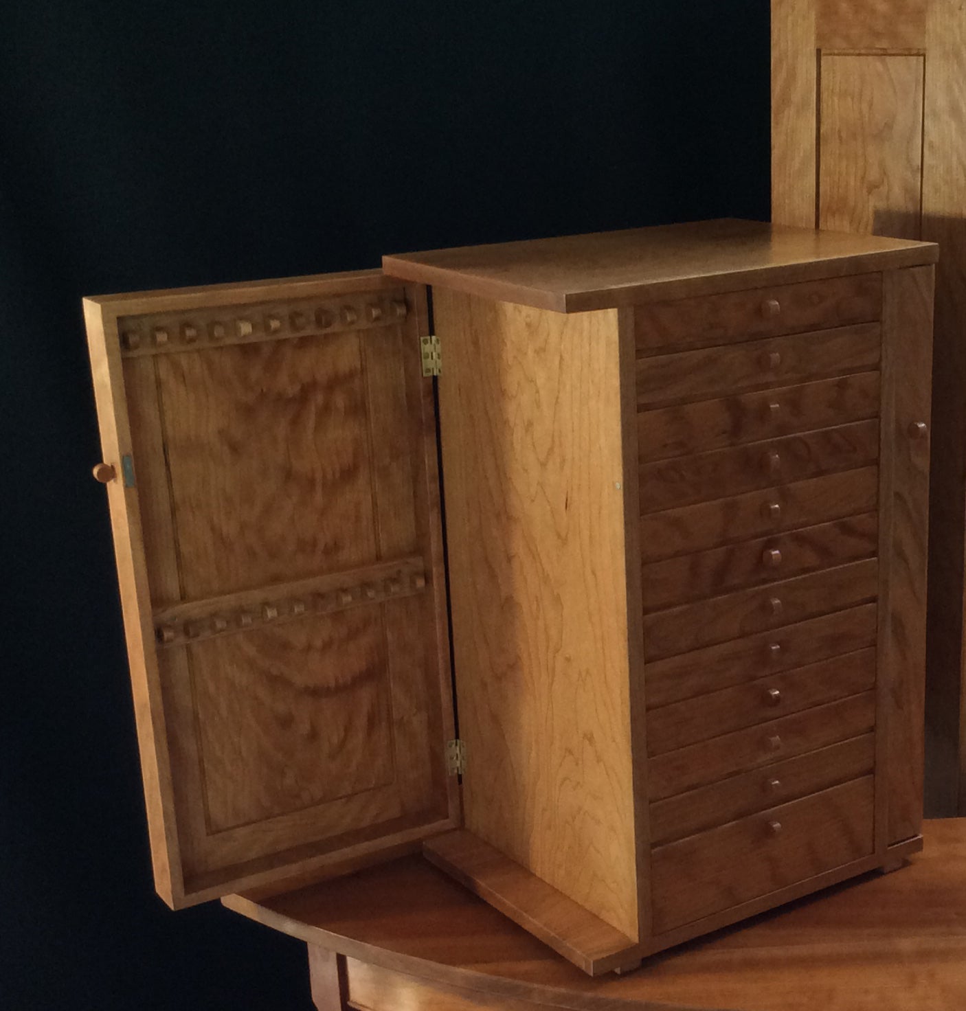 A shot of the Storage Tower with the door open showing an early version of the necklace holding ledger strips with the holders in a single row. The design has been improved to use a wider ledger strip with two rows of staggered holders. This early version has the simple feet, later upgraded to the taller tapered feet.